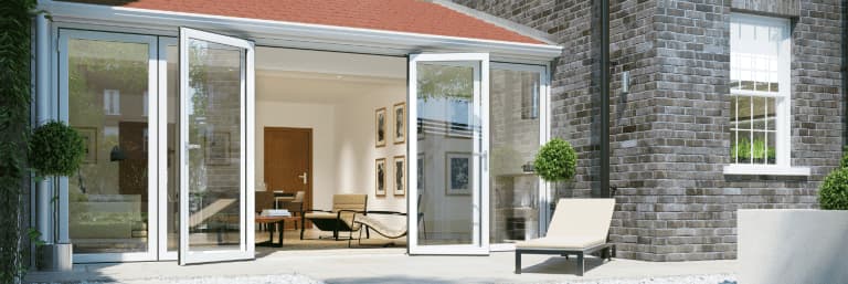Open white aluminium bi-fold doors leading from modern living room to patio – Cristal Windows, Doors & Conservatories