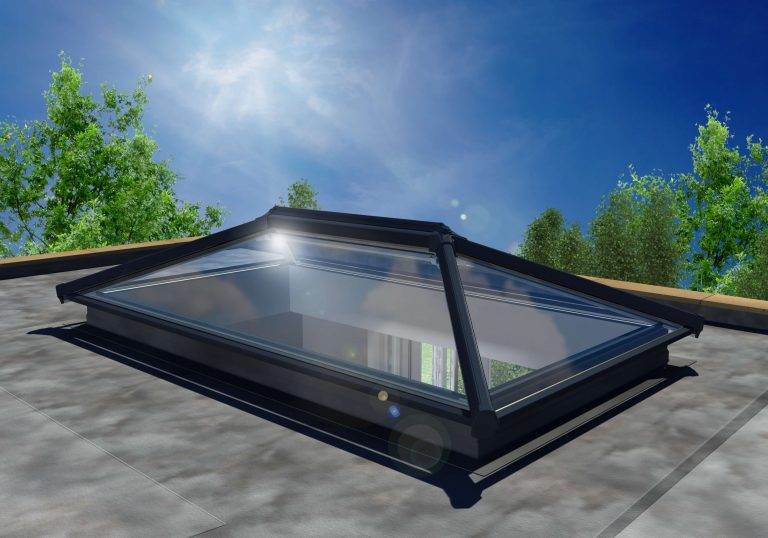 Flat roof lantern skylight with sleek black frame providing natural light and modern style – Cristal Windows, Doors & Conservatories