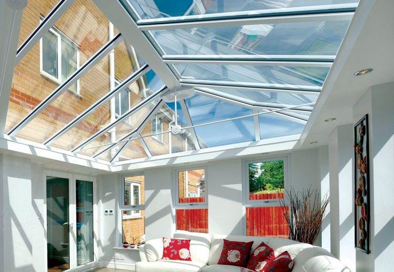 Conservatory roof replacement with modern glass design creating a bright and open living space – Cristal Windows, Doors & Conservatories