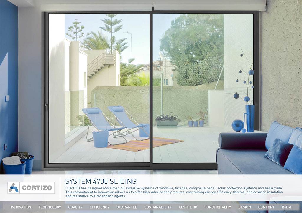 Cortizo 4700 sliding aluminium patio door brochure cover showing large glass doors opening to modern terrace – Cristal Windows, Doors & Conservatories