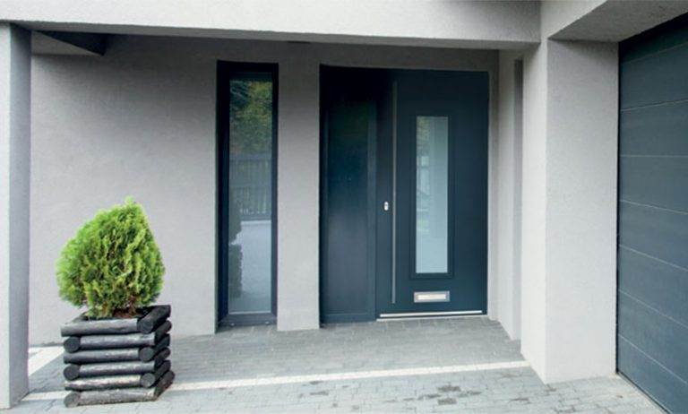 Modern dark grey aluminium composite front door with vertical glazed panel and matching side light – Cristal Windows, Doors & Conservatories