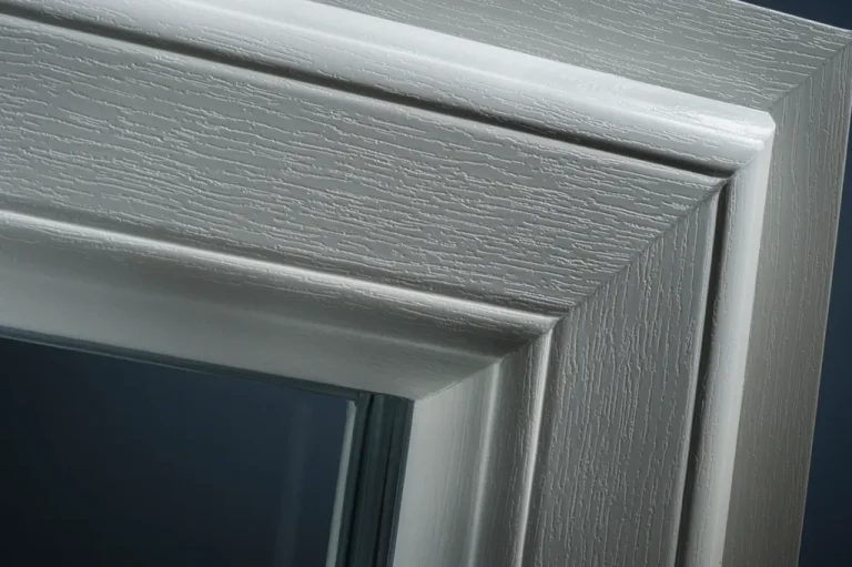 Close-up of grey woodgrain-effect uPVC double glazed window frame - Cristal Windows, Doors & Conservatories